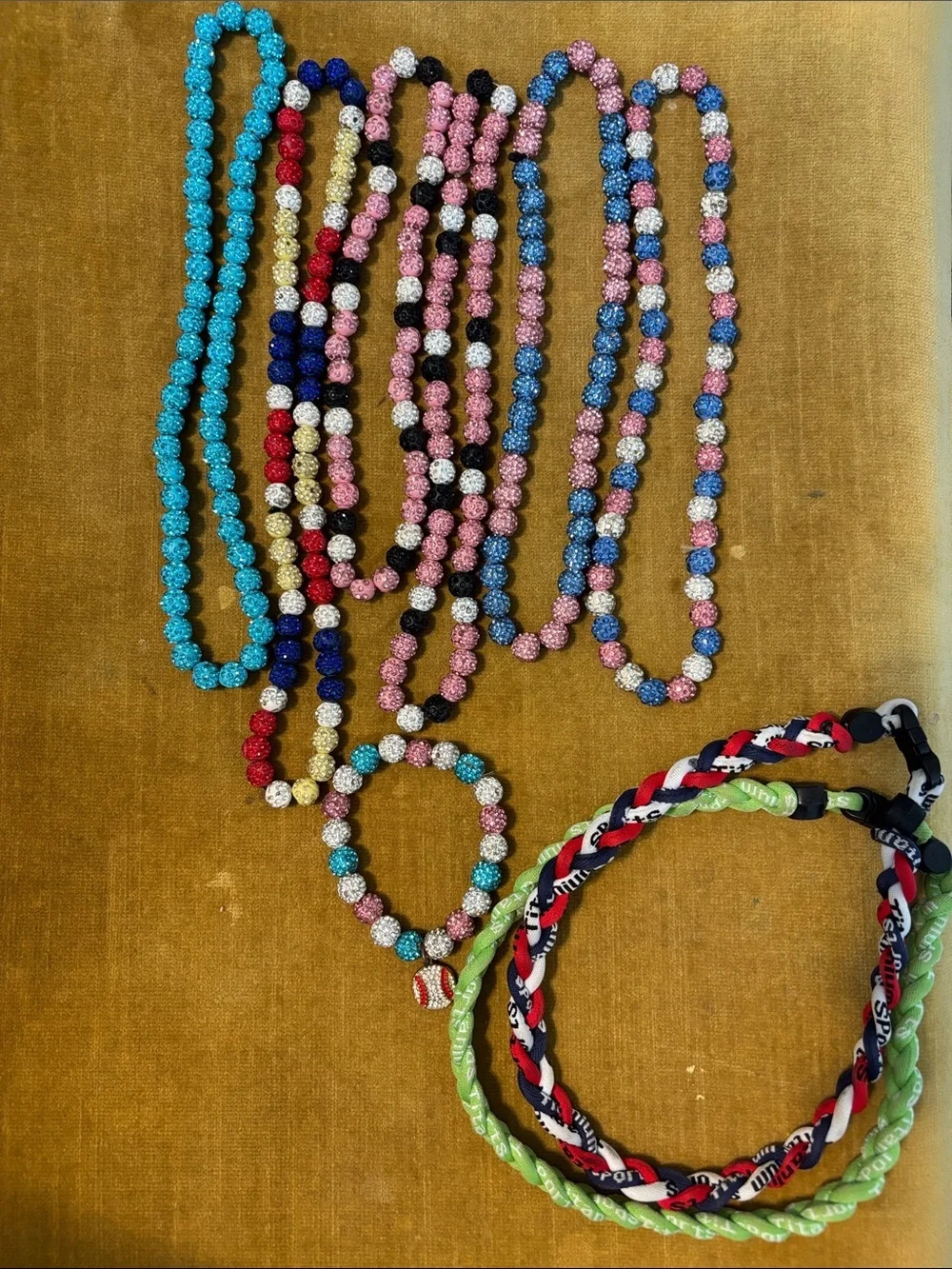 Bundle of baseball necklaces and bracelet